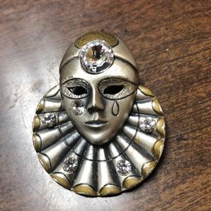 Vintage Harlequin Jester pin.  Silver and copper tone accents. Rhinestones clear